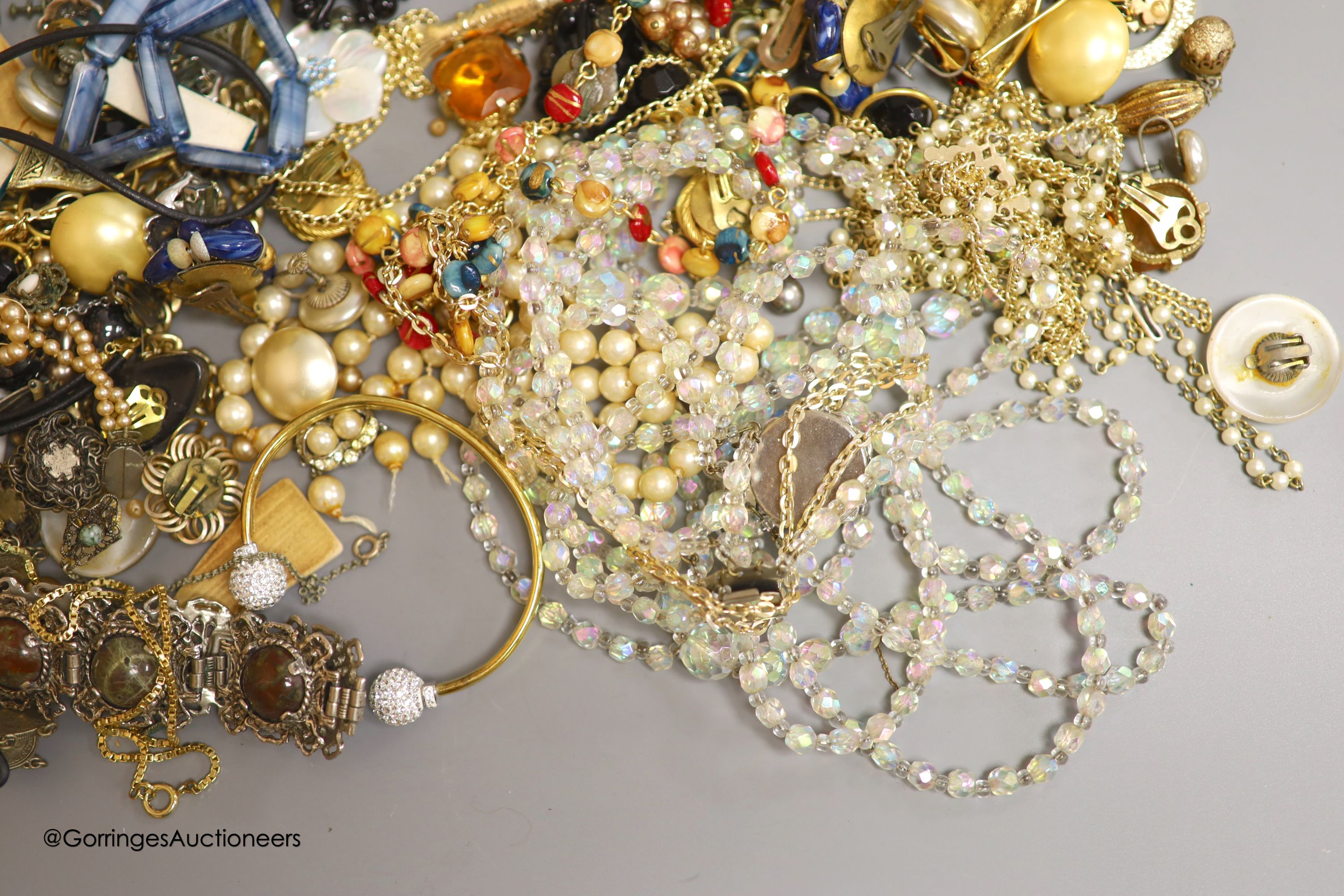 A collection of costume jewellery and other items, including a mother of pearl flower pendant with 9ct suspension